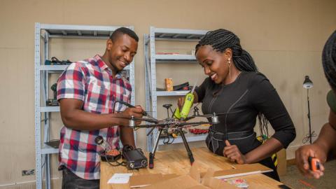 ADDA students Hope Chilunga (left) and Anne Nderitu attach a sensor to a drone. Photo: UNICEF/Moving Minds Multimedia ADDA students Hope Chilunga (left) and Anne Nderitu attach a sensor to a drone. Photo: UNICEF/Moving Minds Multimedia
