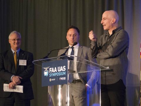 Representatives from the FAA, Google and Amazon discuss drone package delivery. Photo: AUVSI Representatives from the FAA, Google and Amazon discuss drone package delivery. Photo: AUVSI