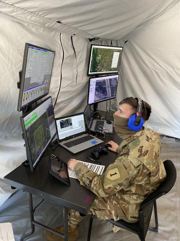 Spc. Nicholas Miller conducts flight operations through a laptop-based ground control station during the FTUAS capabilities assessment at Fort Riley, Kansas, April 8. Photo: Program Executive Office Aviation