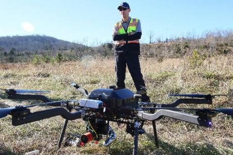 Adam Cretaro, a UAS pilot with Skytec, talks about one of the drones he uses for data collection and mapping Monday, December 17, 2018 at a farm in McDonald, Tennessee. Photo by Erin O. Smith