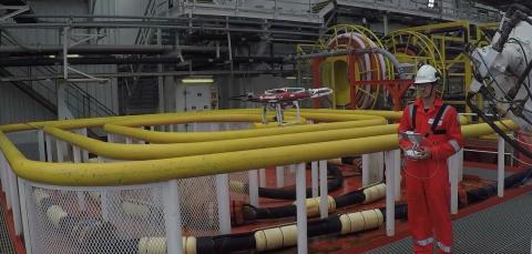 DNV GL surveyor Fryderyk Hoga begins the drone survey on board Safe Scandinavia, photo courtesy of DNV GL.