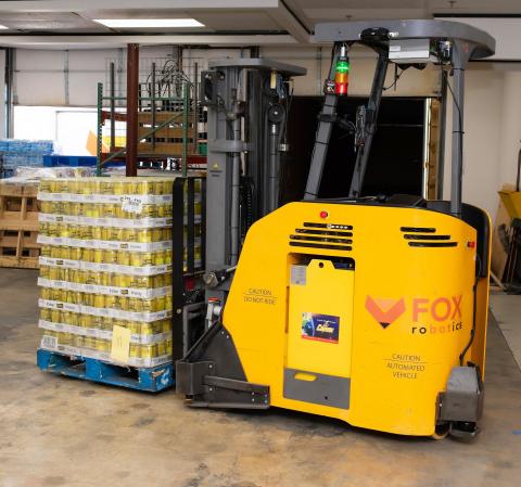 Fox's self-driving forklift is the only automated forklift capable of automatically unloading a trailer. Photo: PRNewswire