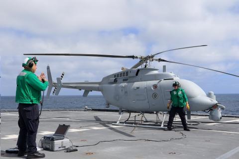 Aviation Machinist's Mate 2nd Class Salvatore Green and Aviation Electronics Technician 3rd Class Jake Price prepare the MC-8C Fire Scout unmanned helicopter for launch aboard the littoral combat ship USS Coronado. U.S. Navy photo by Ensign Jalen Robinson