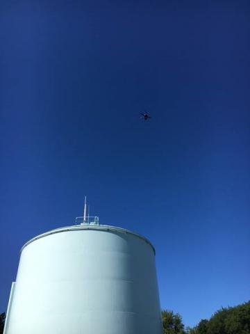 A small unmanned aircraft system (sUAS) otherwise known as a "drone" inspects a SUEZ water tower. Photo: Sky Scape Industries