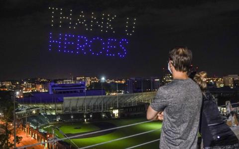 Drones light up Nashville sky in tribute to health care heroes, frontline workers and first responders. Photo: Vanderbilt University